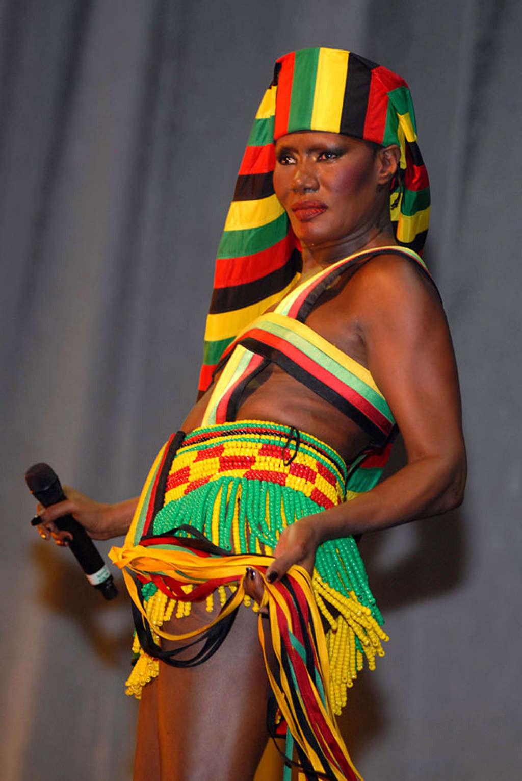 16P Grace Jones tits slip and upskirt on stage paparazzi pictures