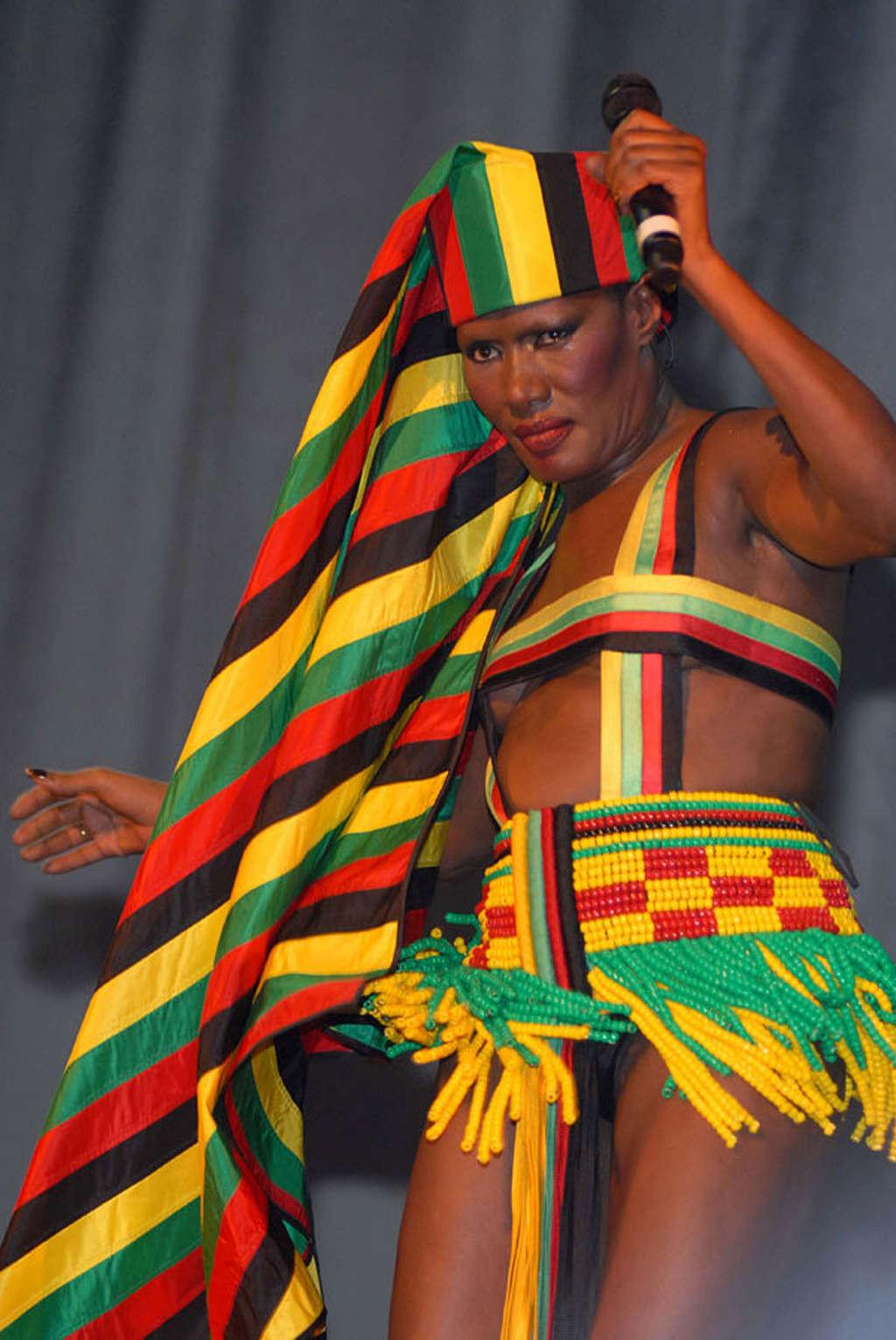 16P Grace Jones tits slip and upskirt on stage paparazzi pictures