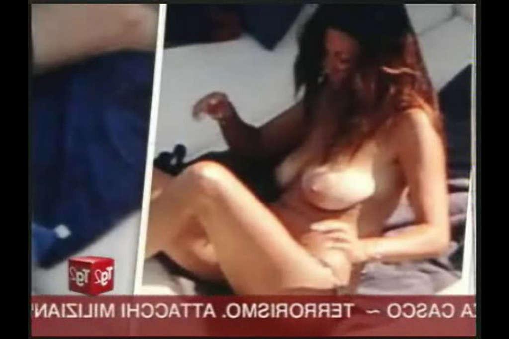 16P Sabrina Ferilli showing sexy ass in thong and extremely huge tits