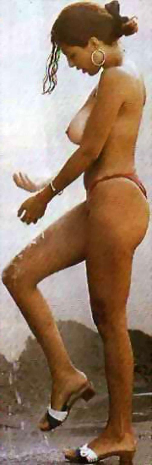 16P Sabrina Ferilli showing sexy ass in thong and extremely huge tits