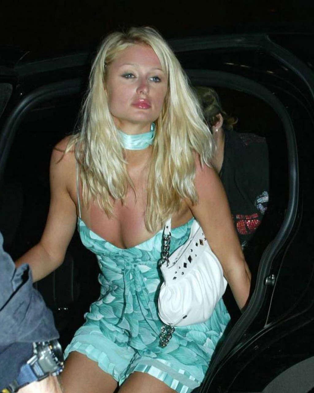 16P Paris Hilton spread her legs and showing sexy underwear in purple skirt