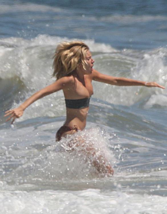 15P Sienna Miller in bikini and sunbathing topless