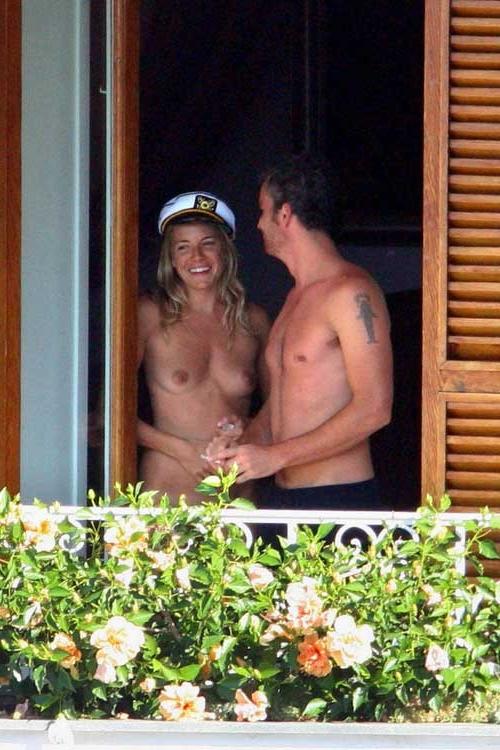 15P Sienna Miller in bikini and sunbathing topless