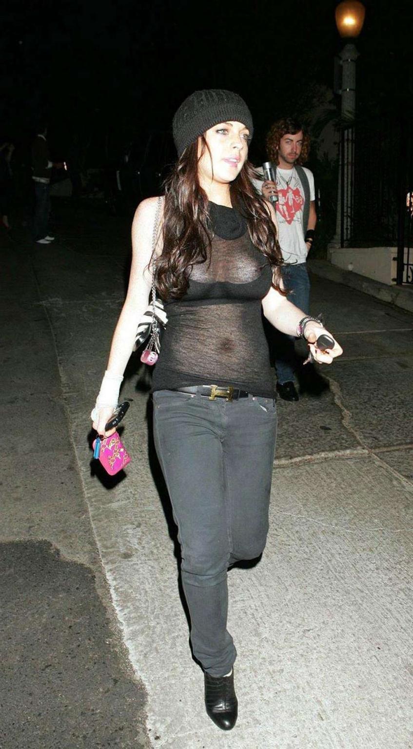 16P Lindsay Lohan exposing her nice big tits and see thru top paparazzi pictures