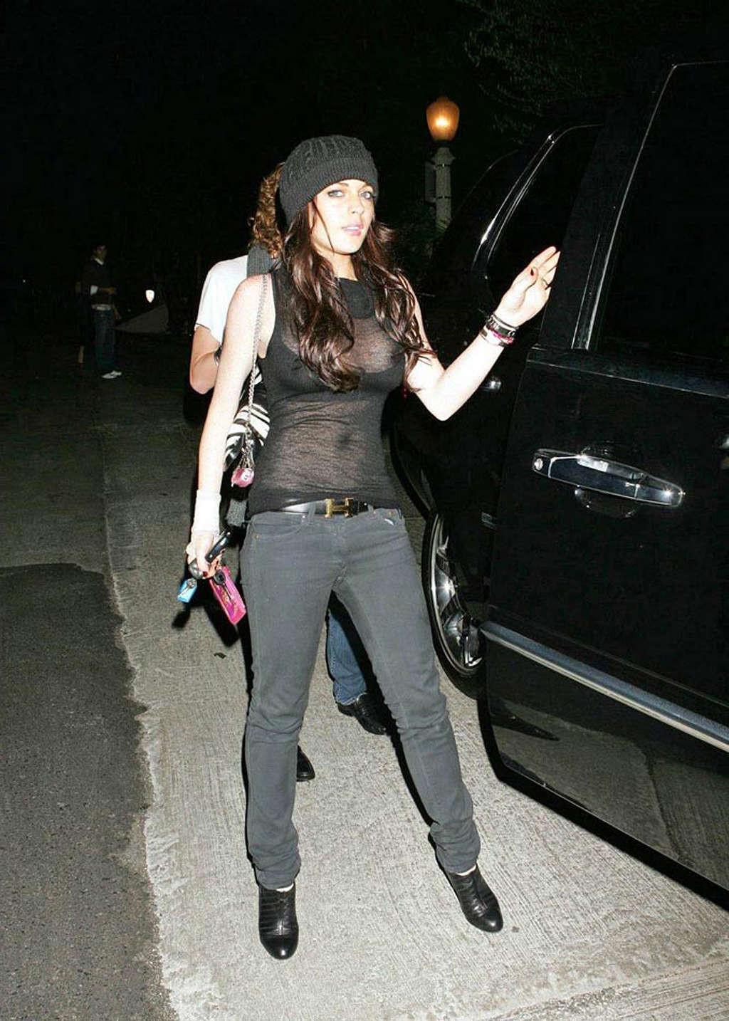 16P Lindsay Lohan exposing her nice big tits and see thru top paparazzi pictures