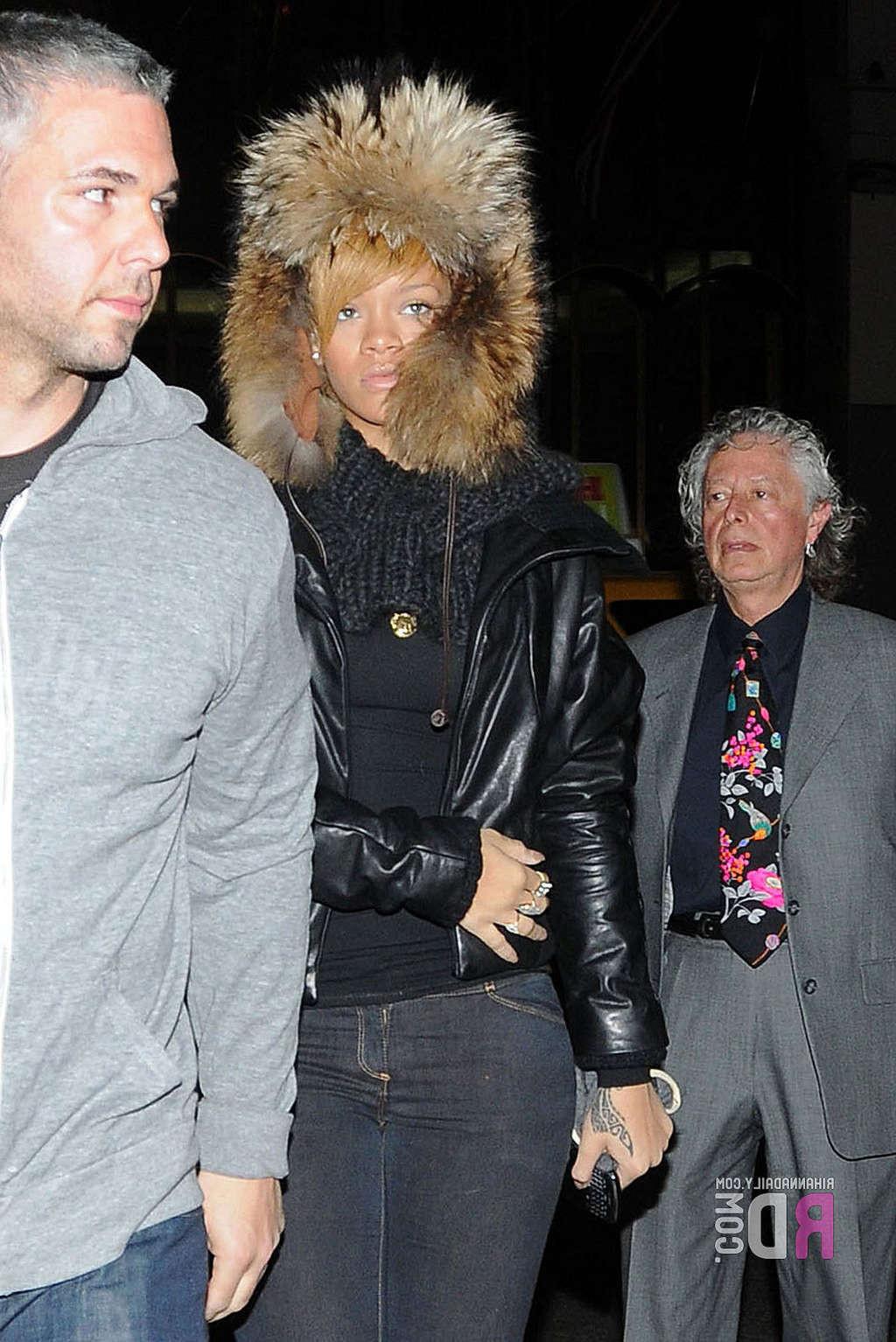 10P Rihanna exposing her nice big tits in see thru top for magazine and posing sexy 
