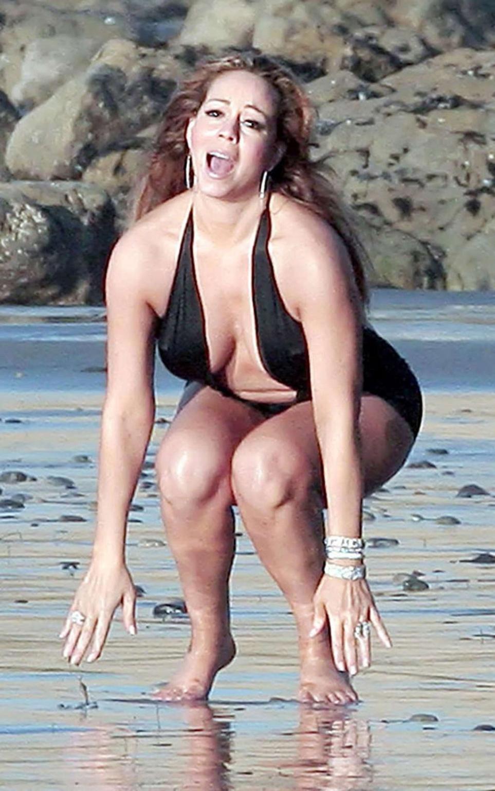 16P Mariah Carey looking sexy in bikini and showing big tits
