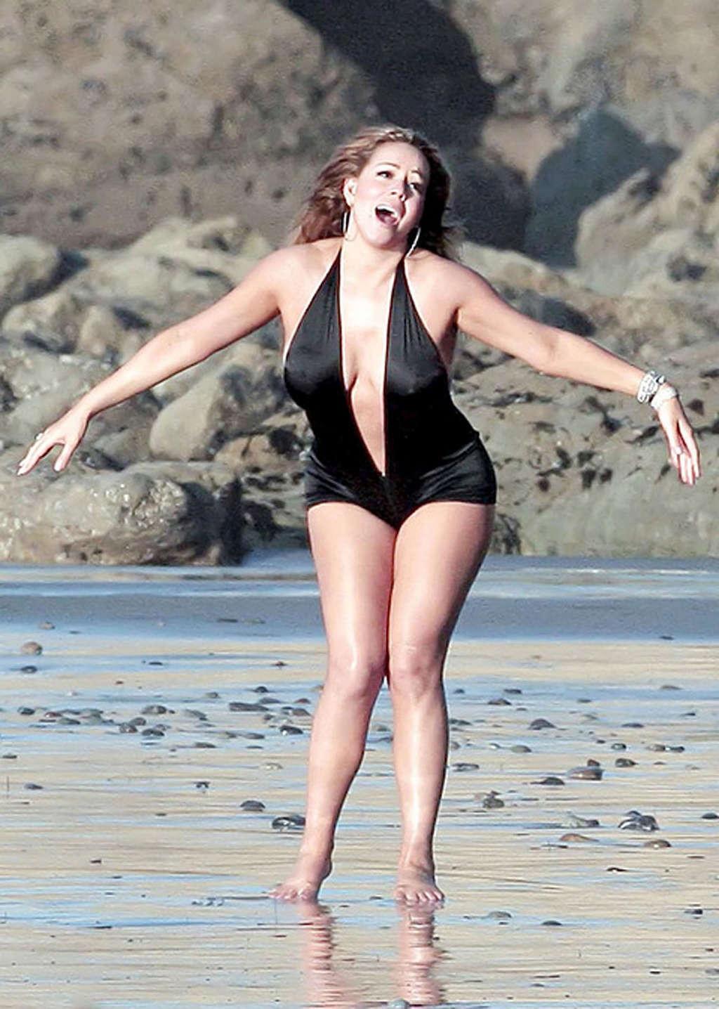 16P Mariah Carey looking sexy in bikini and showing big tits