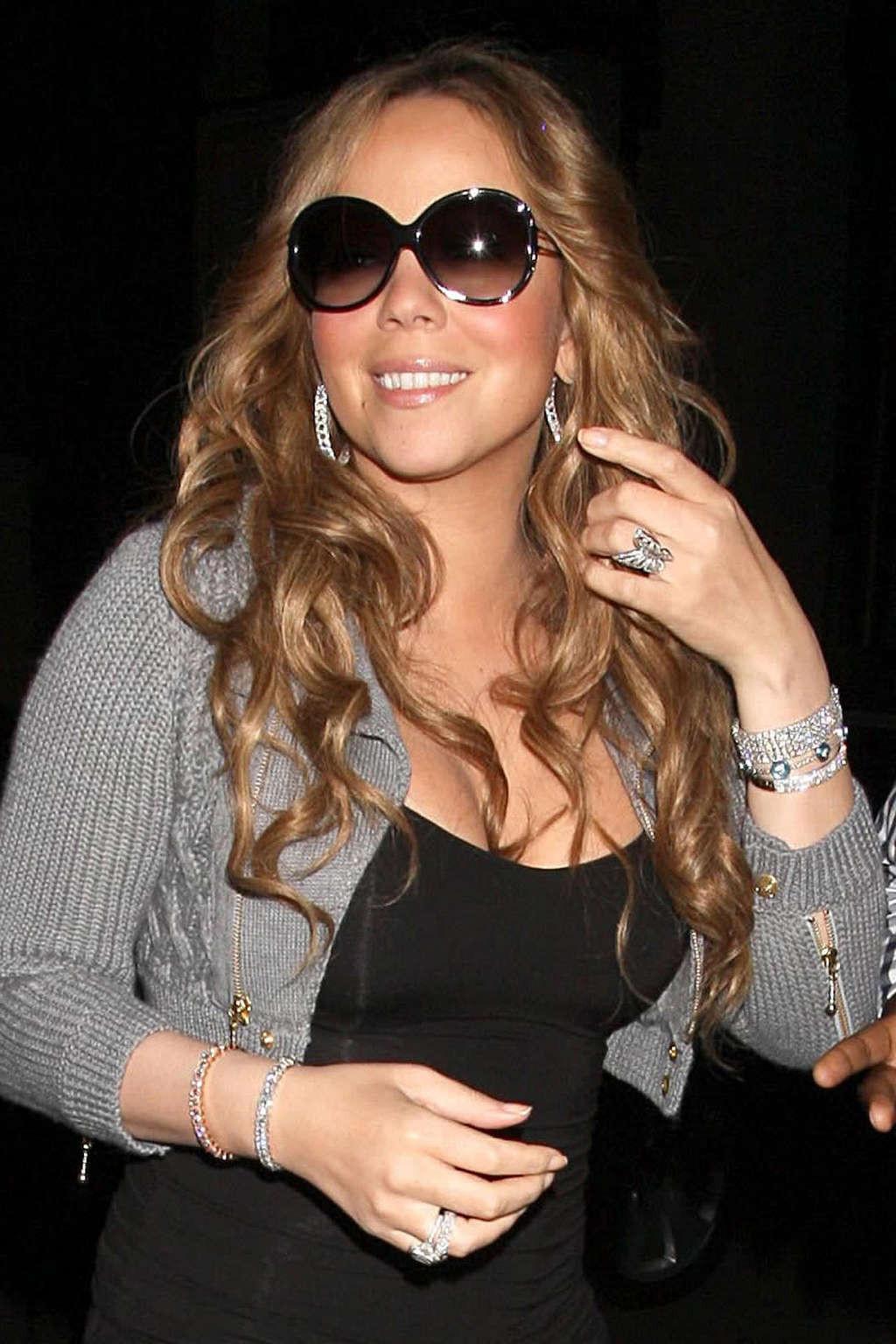 16P Mariah Carey looking sexy in bikini and showing big tits