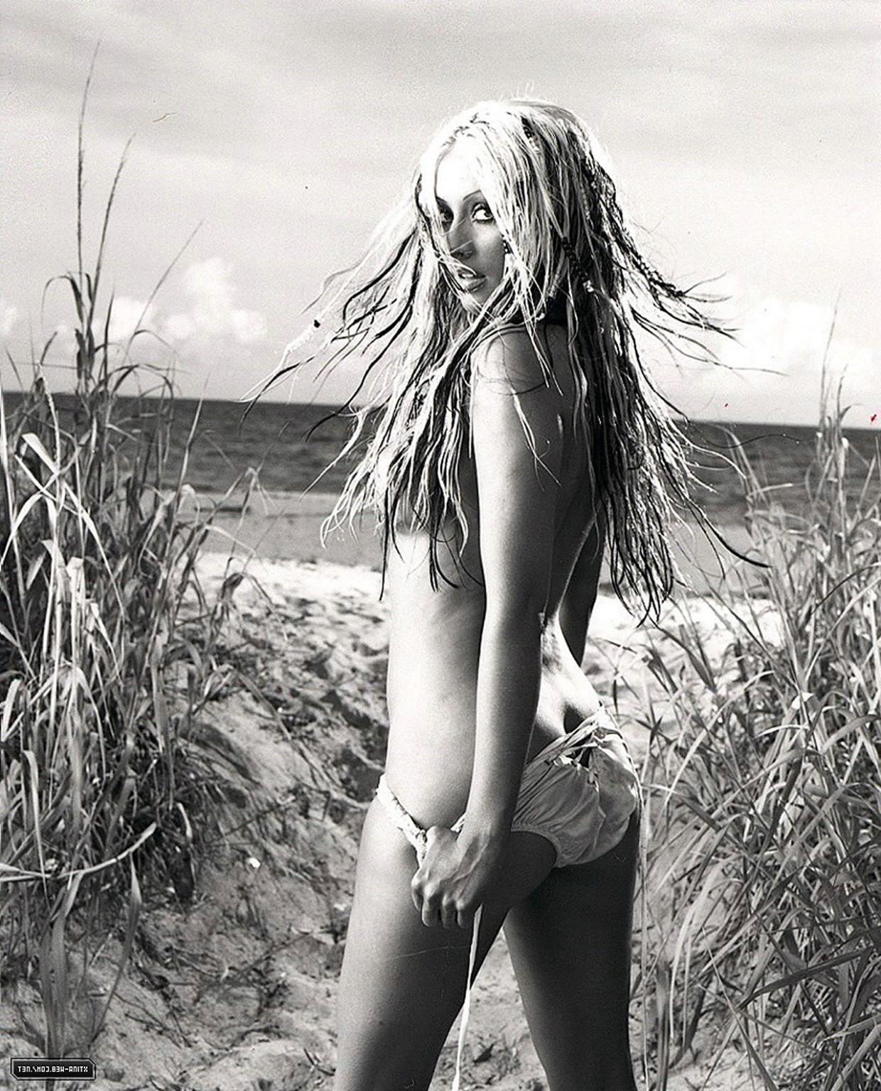 16P Christina Aguilera shooting for some magazine in thong and showing naked tits