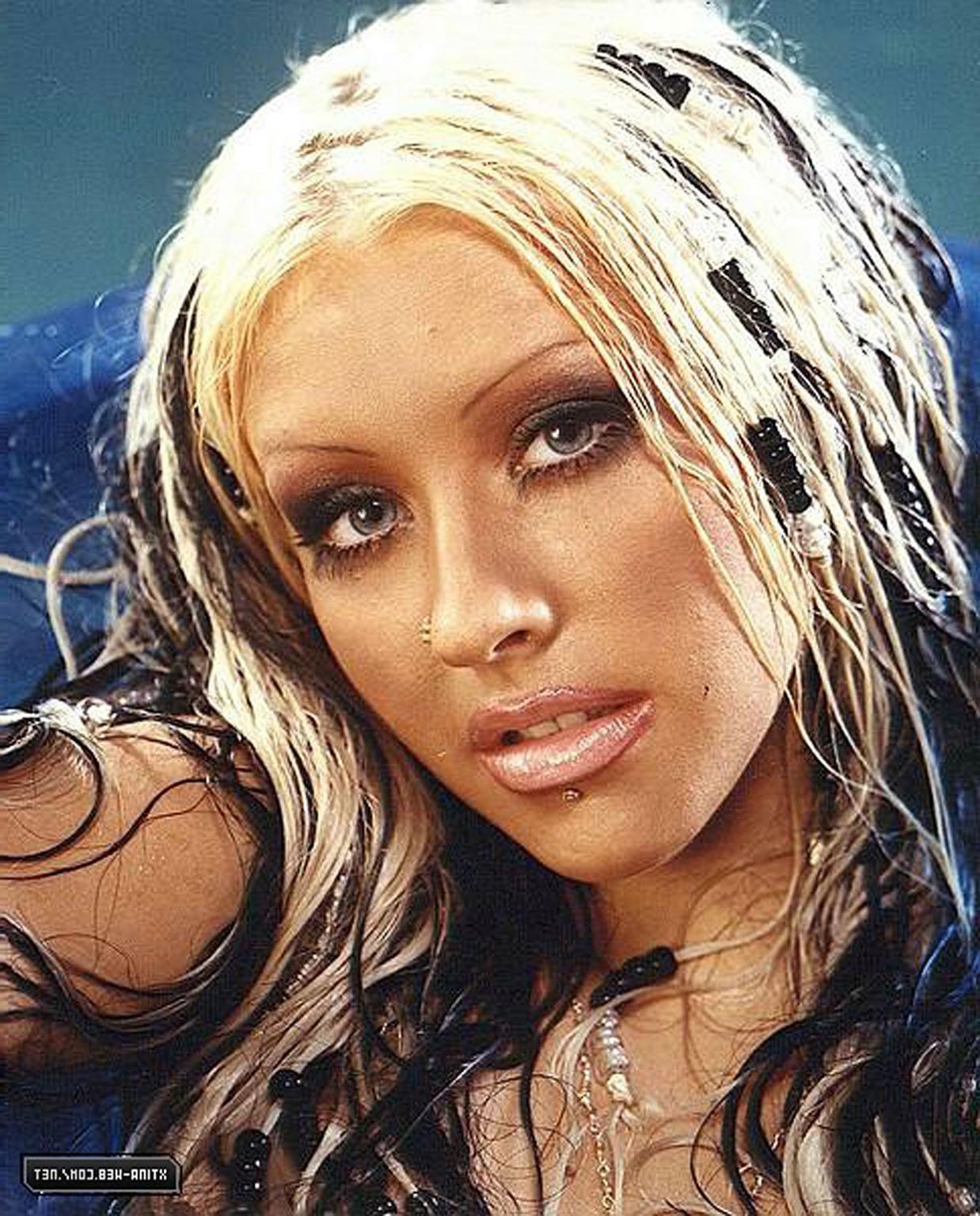16P Christina Aguilera shooting for some magazine in thong and showing naked tits