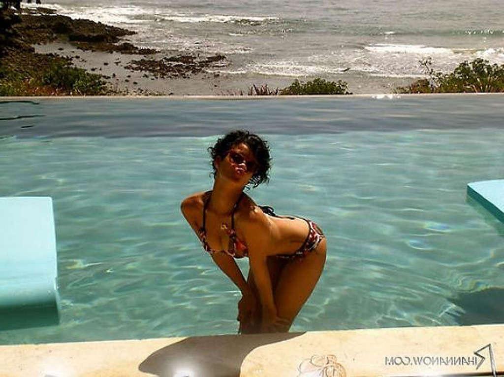 16P Rihanna enjoying on pool and showing her sexy tits and ass in evening skirt