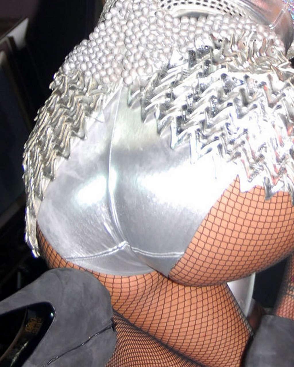16P Rihanna enjoying on pool and showing her sexy tits and ass in evening skirt