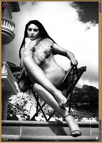 10P Monica Bellucci showing naked breasts and buttocks