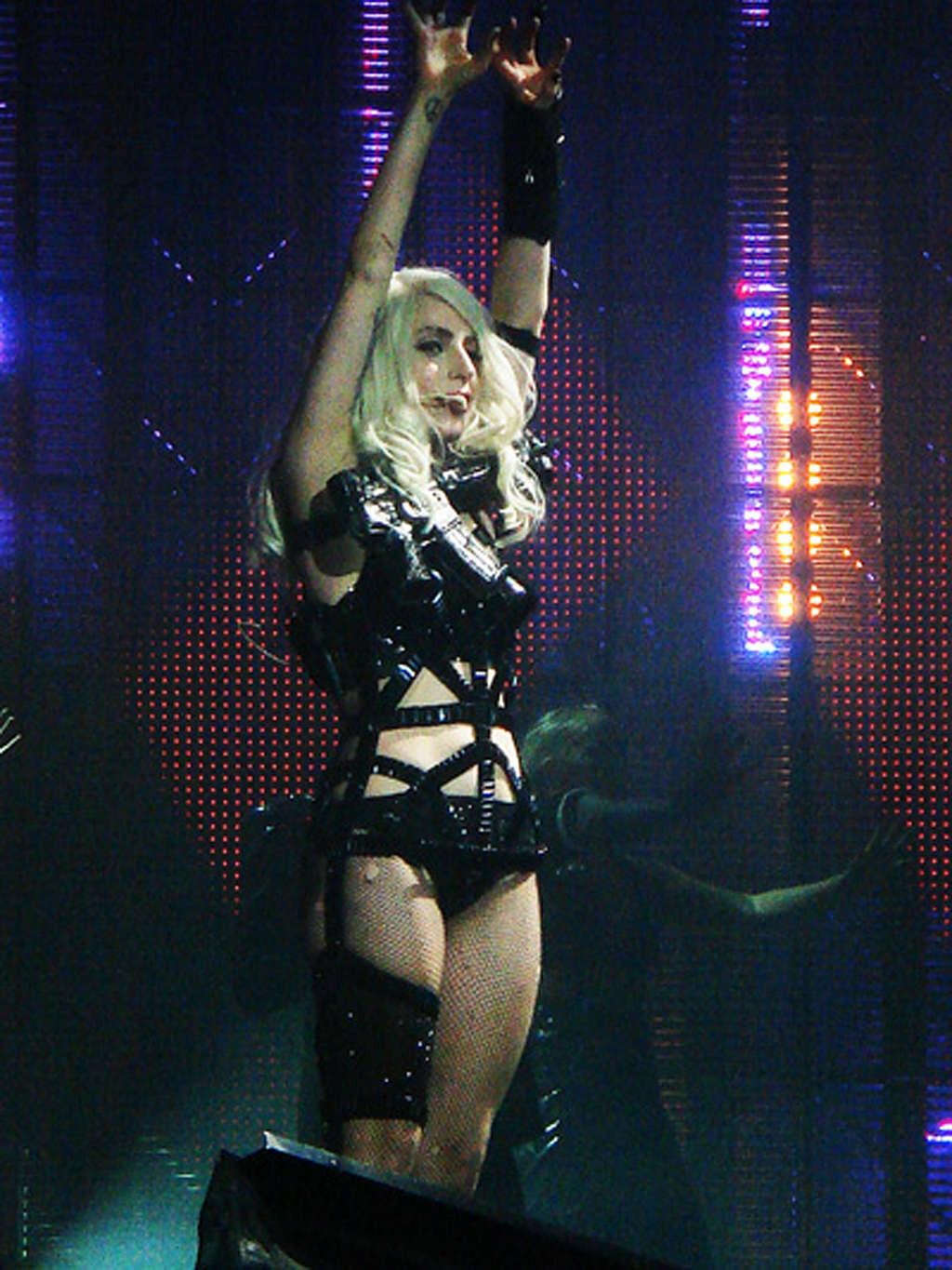 16P Lady Gaga in ripped fishnet stockings flashing her panties in public