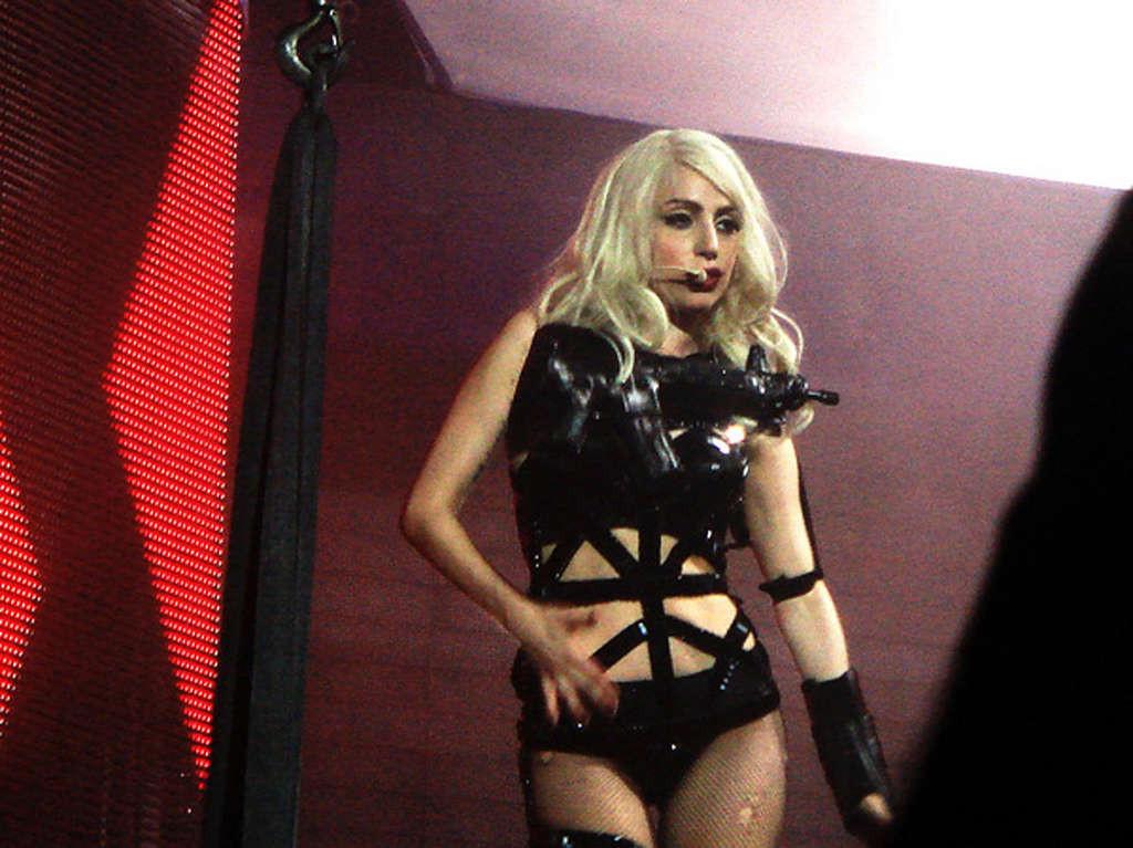 16P Lady Gaga in ripped fishnet stockings flashing her panties in public