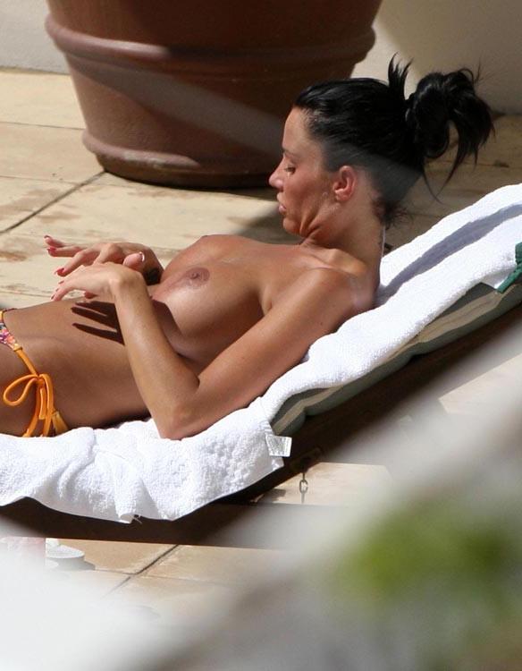15P Katie Price showing tattoo on her shaved pussy