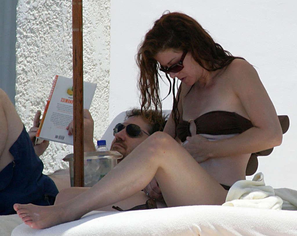 16P Debra Messing nipple slip on beach paparazzi pictures and posing nude