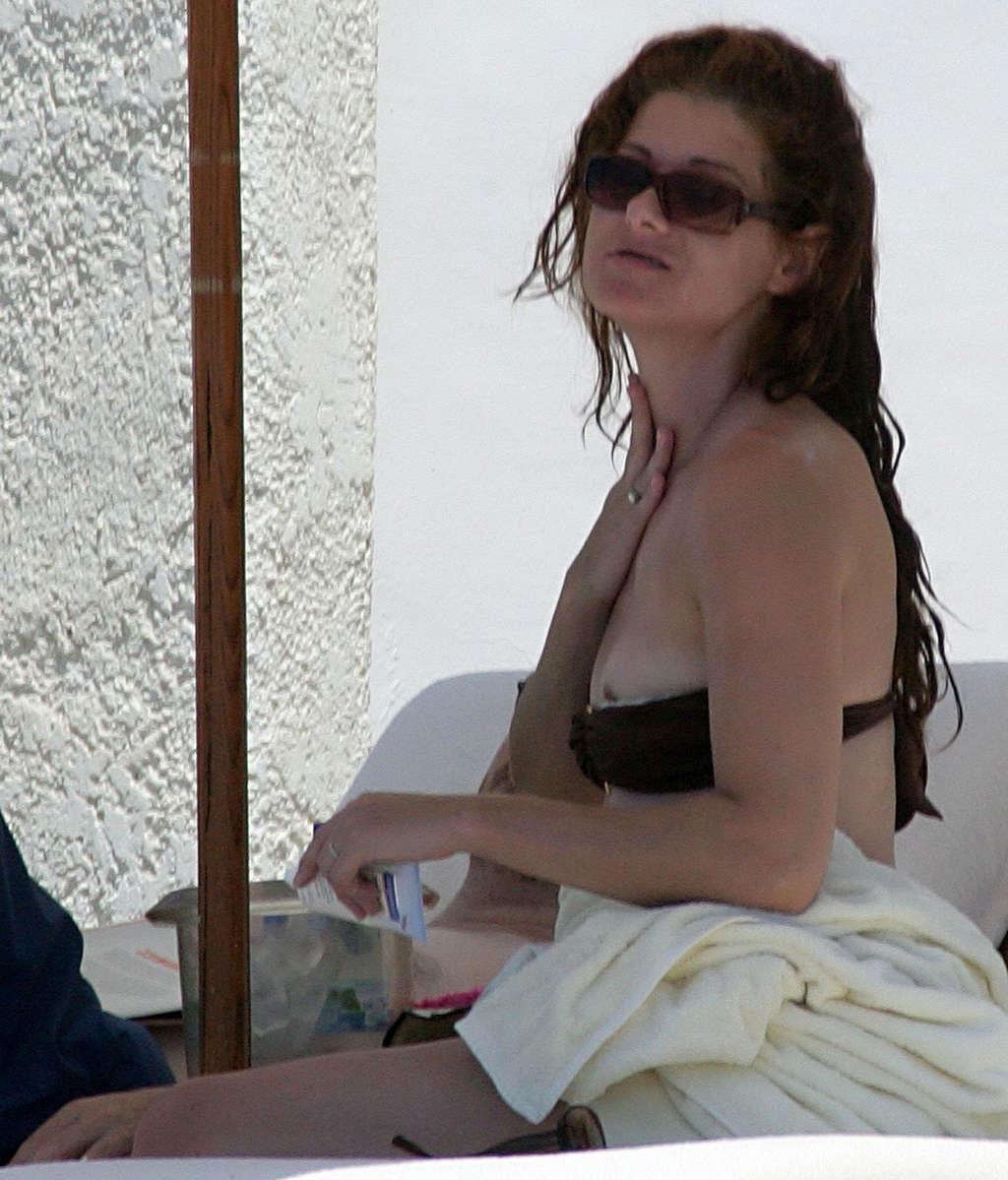 16P Debra Messing nipple slip on beach paparazzi pictures and posing nude