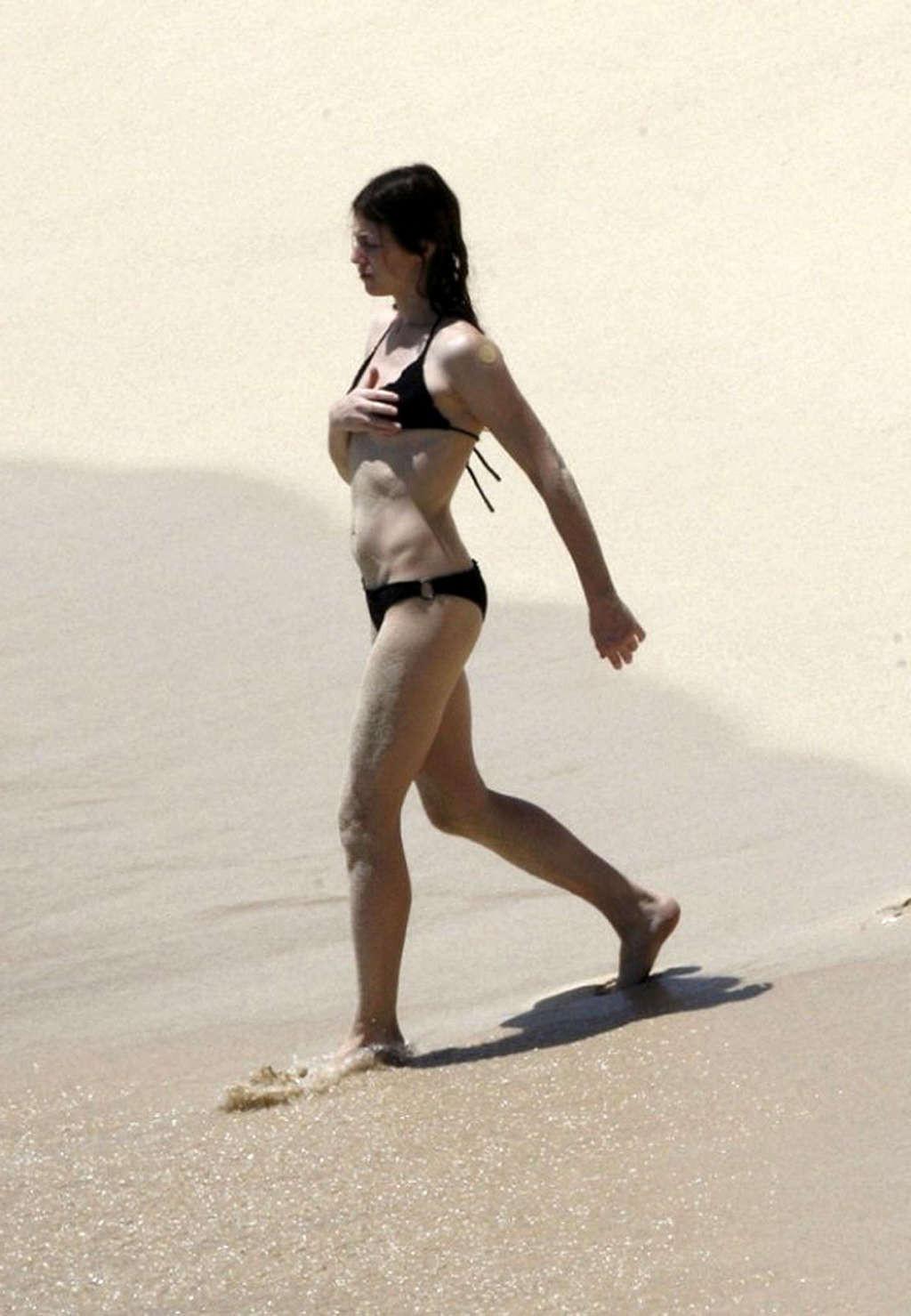 16P Charlotte Gainsbourg nude on the beach and shows ass in thong