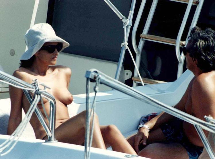 15P Monica Bellucci sunbathing her big exposed boobs