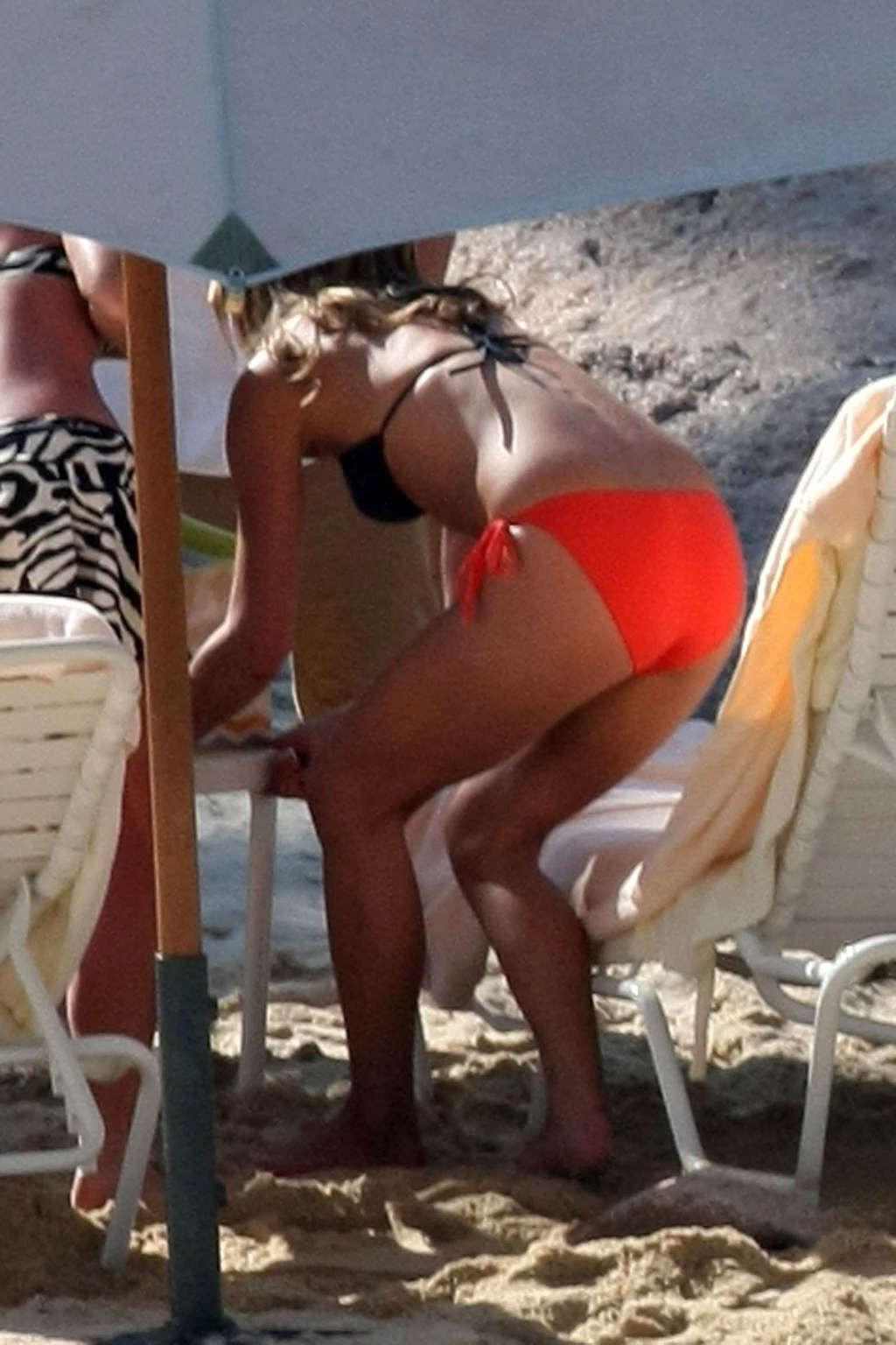 16P Jennifer Aniston showing her perfect and sexy ass in bikini on beach