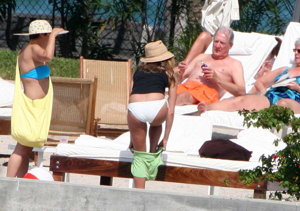 16P Jennifer Aniston showing her perfect and sexy ass in bikini on beach
