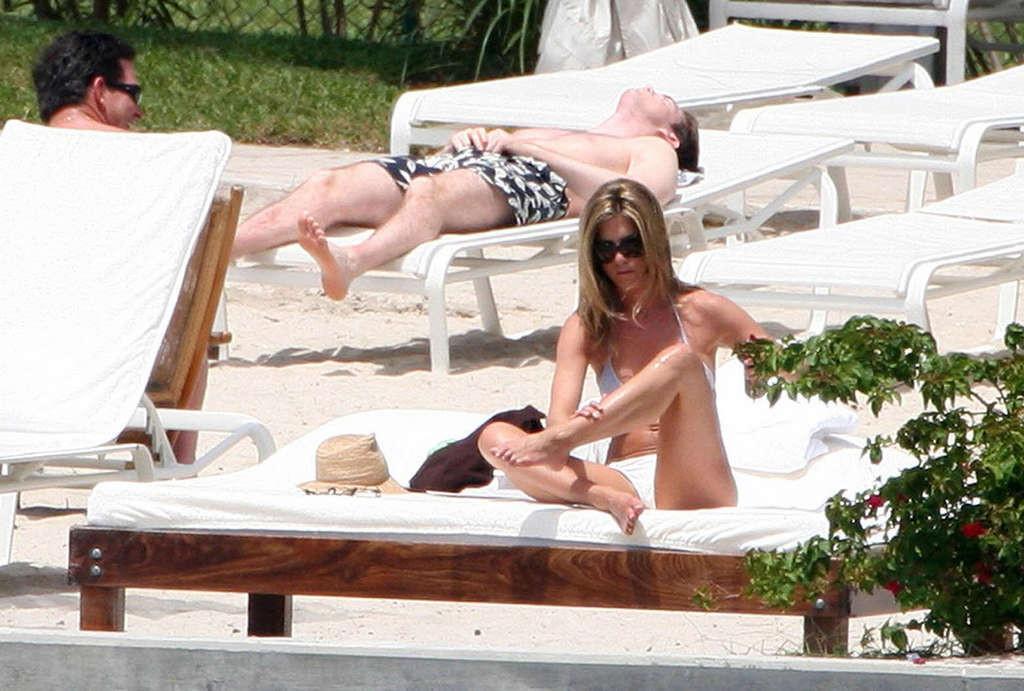16P Jennifer Aniston showing her perfect and sexy ass in bikini on beach