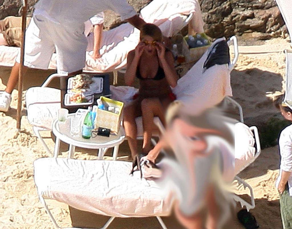 16P Jennifer Aniston showing her perfect and sexy ass in bikini on beach