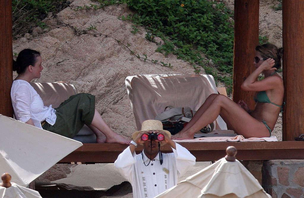 16P Jennifer Aniston showing her perfect and sexy ass in bikini on beach