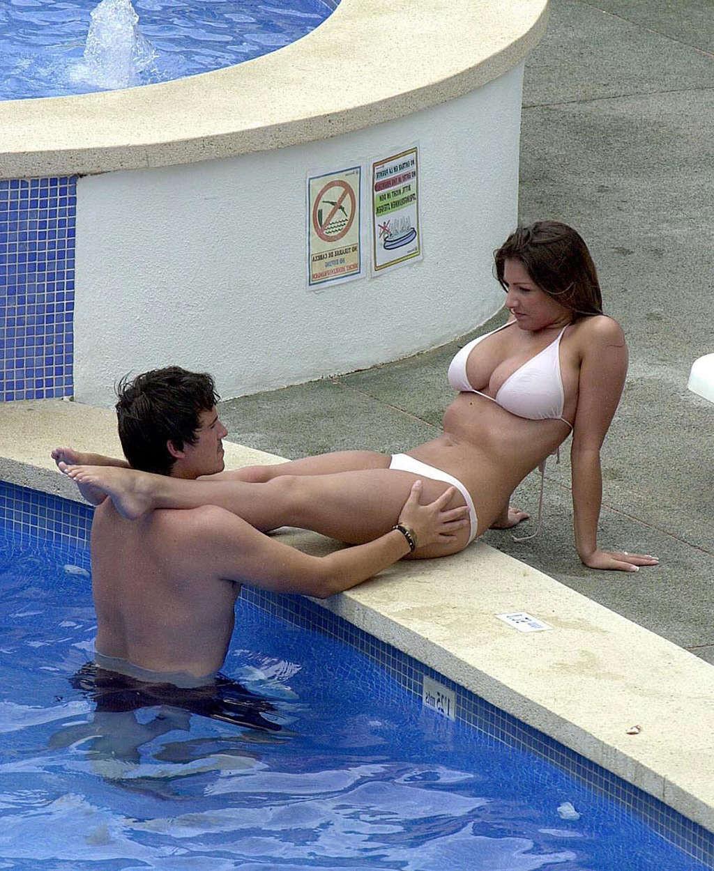 16P Lucy Pinder relaxing on pool and showing her great and incredibly sexy tits