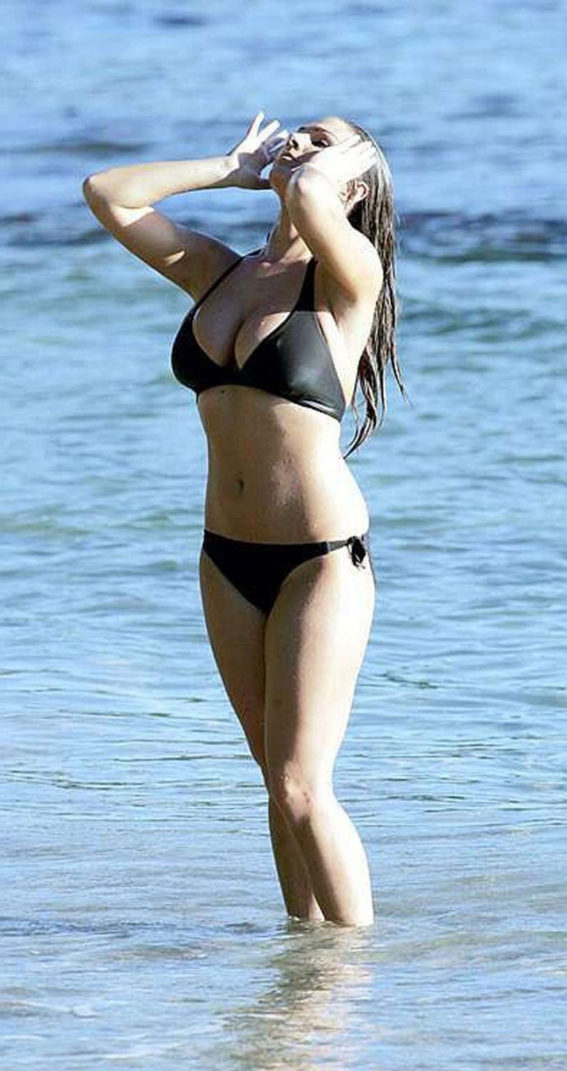 16P Lucy Pinder relaxing on pool and showing her great and incredibly sexy tits