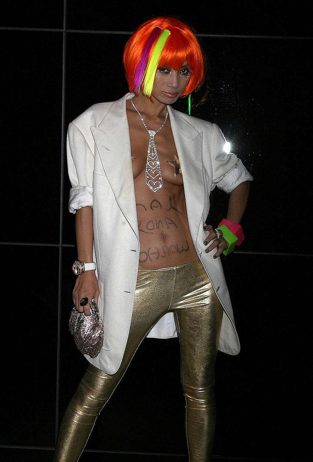 16P Bai Ling exposing her nice small tits and nipple slip paparazzi pictures