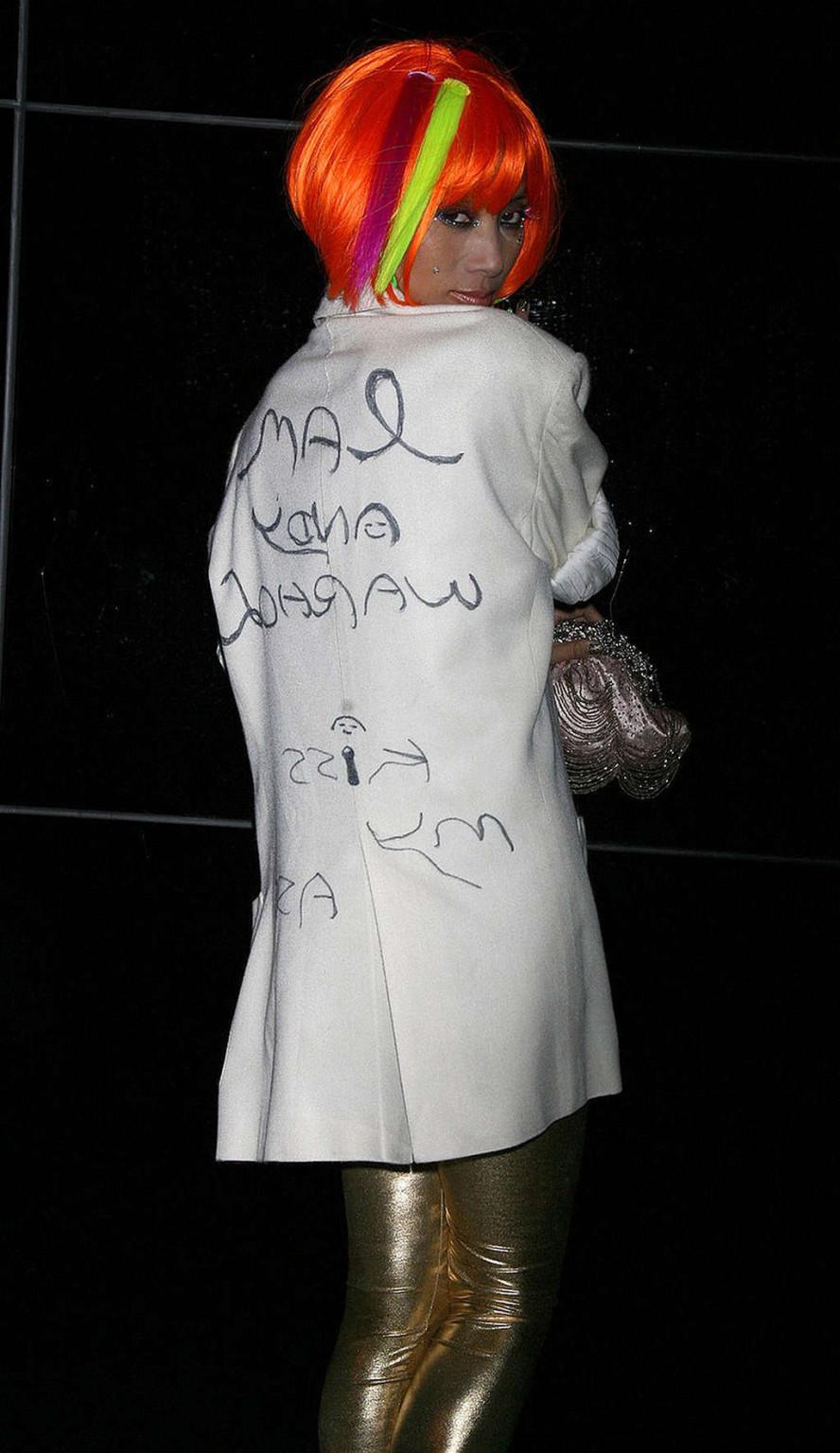 16P Bai Ling exposing her nice small tits and nipple slip paparazzi pictures