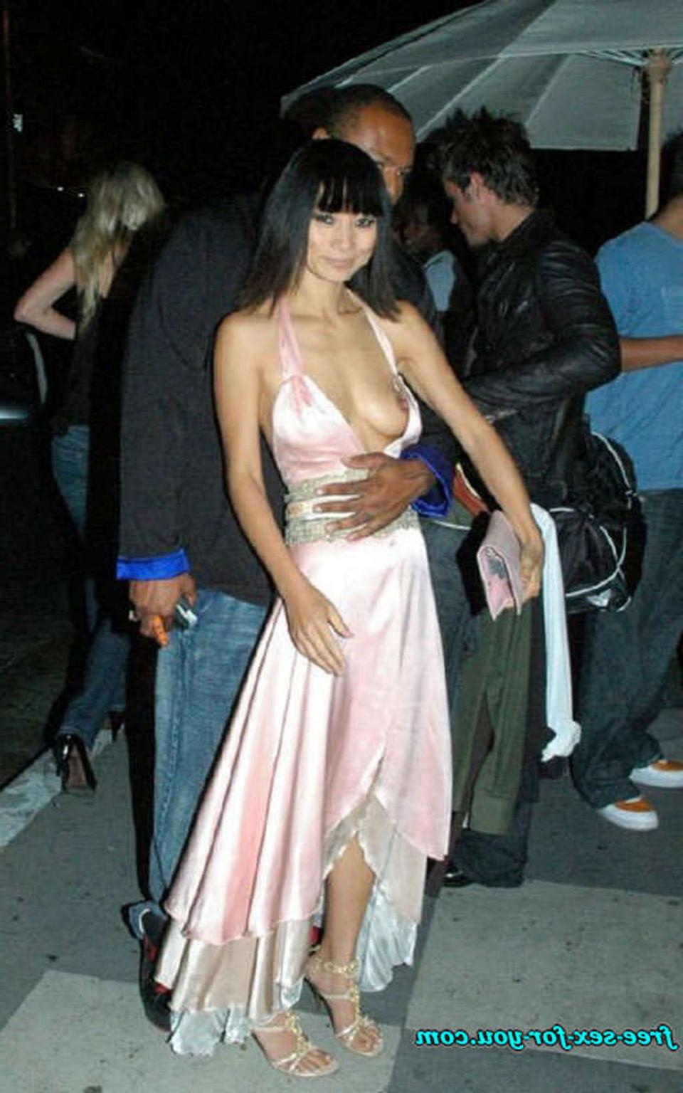 16P Bai Ling exposing her nice small tits and nipple slip paparazzi pictures