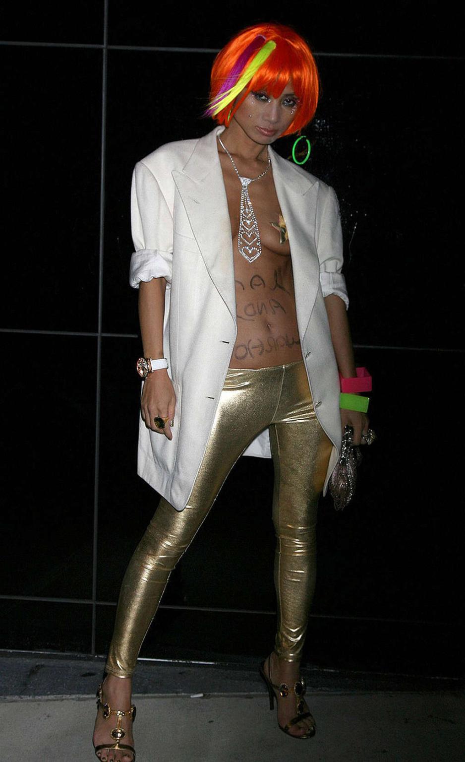 16P Bai Ling exposing her nice small tits and nipple slip paparazzi pictures