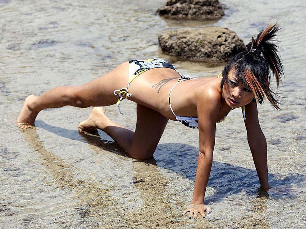 16P Bai Ling shows naked tits and very hot body paparazzi pictures
