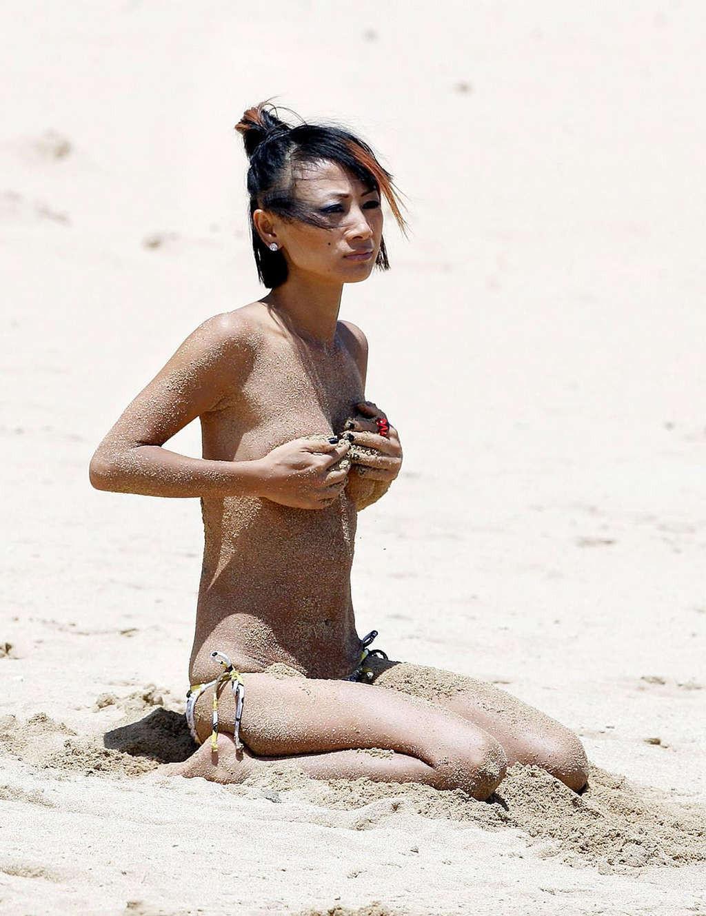 16P Bai Ling shows naked tits and very hot body paparazzi pictures
