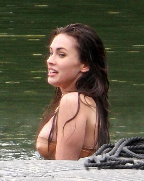 10P Megan Fox exposing her nice big tits and posing sexy on set for some movie