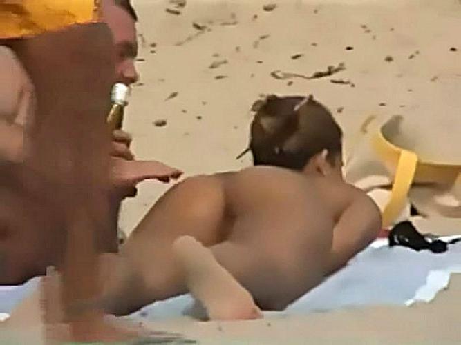 10P Clara Morgane exposing her nice big tits and pussy on beach paparazzi pictures