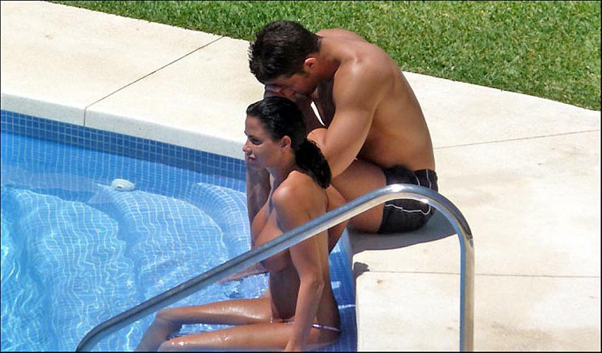 16P Katie Price Jordan exposing her big tits in pool paparazzi pictures