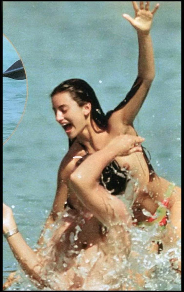 15P Penelope Cruz showing sweet topless on the beach