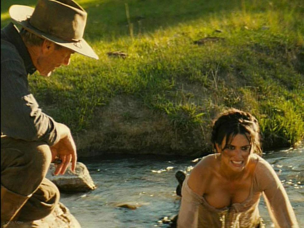 15P Penelope Cruz showing sweet topless on the beach