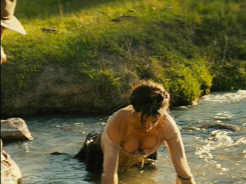 15P Penelope Cruz showing sweet topless on the beach