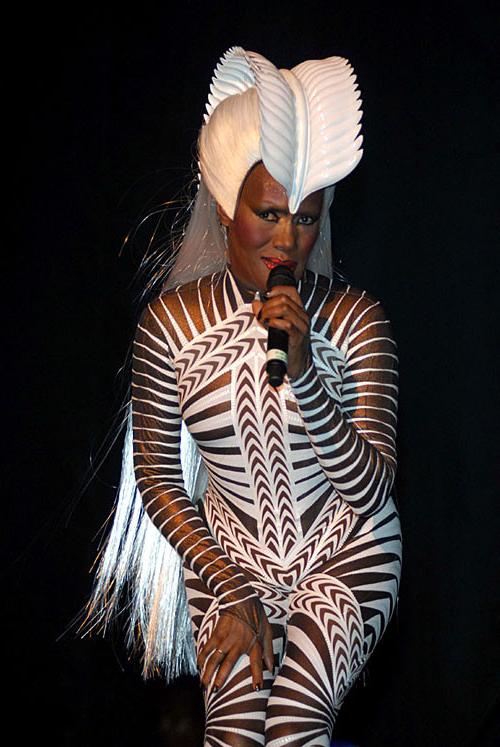 10P Grace Jones showing her nice ass upskirt on stage paparazzi pictures