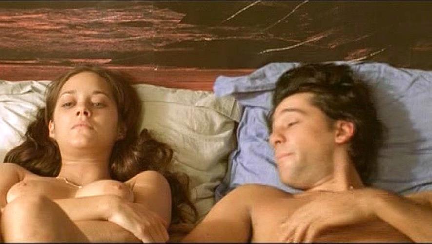 10P Marion Cotillard showing her nice big tits in some nude movie caps