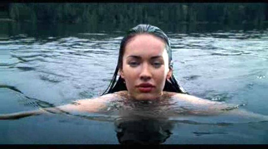 10P Megan Fox showing her nice big tits in some nude movie caps and posing very sexy