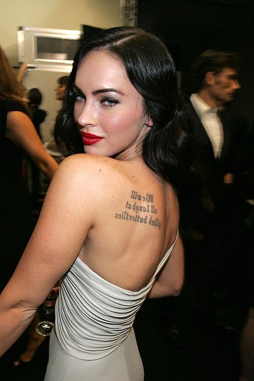 10P Megan Fox showing her nice big tits in some nude movie caps and posing very sexy