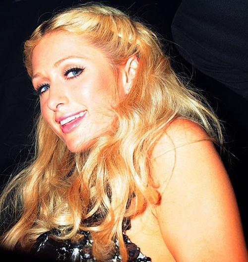 10P Paris Hilton showing her nice small tits and great legs in some photoshoot