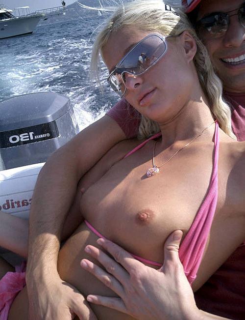 10P Paris Hilton showing her nice small tits and great legs in some photoshoot